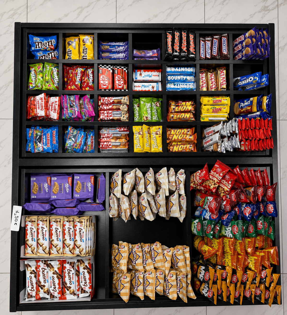 Présentoir de chocolats et bonbons importés chez Fresh Market